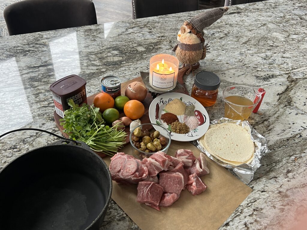 Fresh ingredients for carnitas tacos with chestnut mole sauce