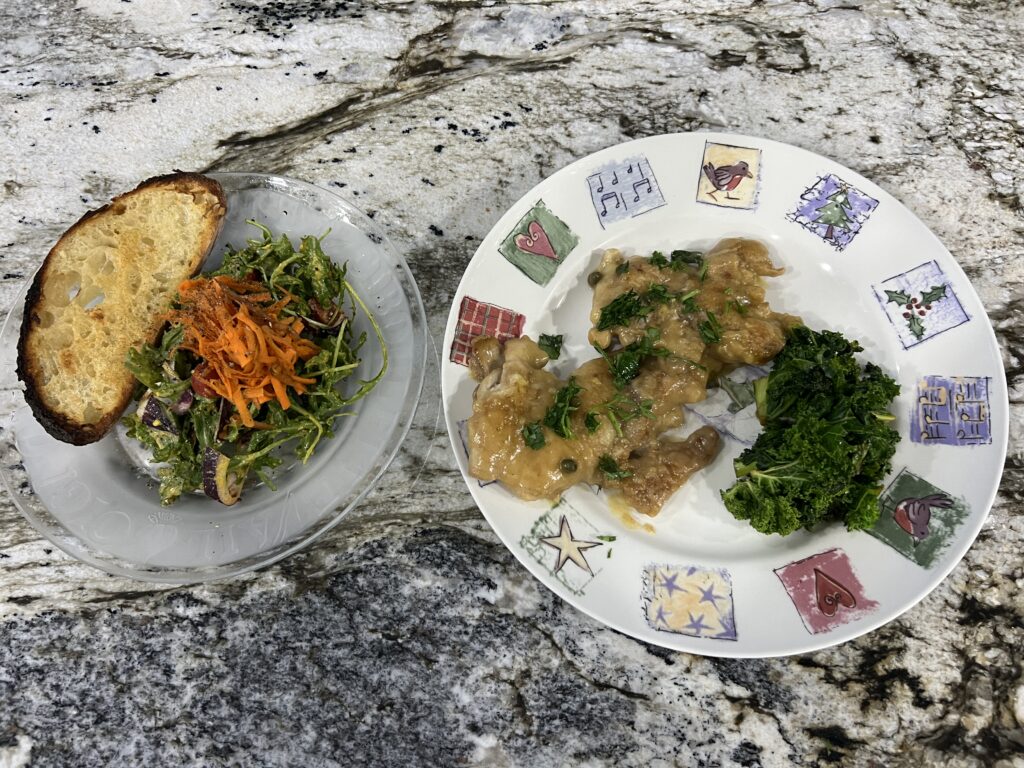 Apple-chestnut chicken piccata served with sautéed greens and salad, showing how to cook chestnuts in a light, healthy savory dish
